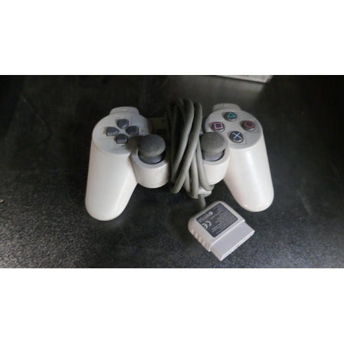 5044 - A Playstation One games console with controller with 4 games - Die Hard Trilogy, Warzone 2100, 007 T... 