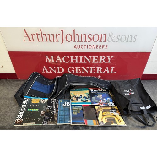 5019 - A large quantity of guitar books and a guitar bag