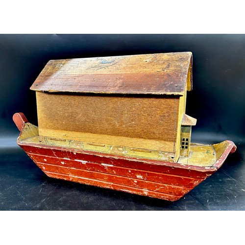 2277 - A 19th century painted wooden Noah's Ark toy, with sliding detachable side, 46cm long