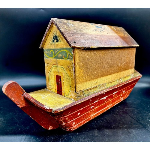 2277 - A 19th century painted wooden Noah's Ark toy, with sliding detachable side, 46cm long