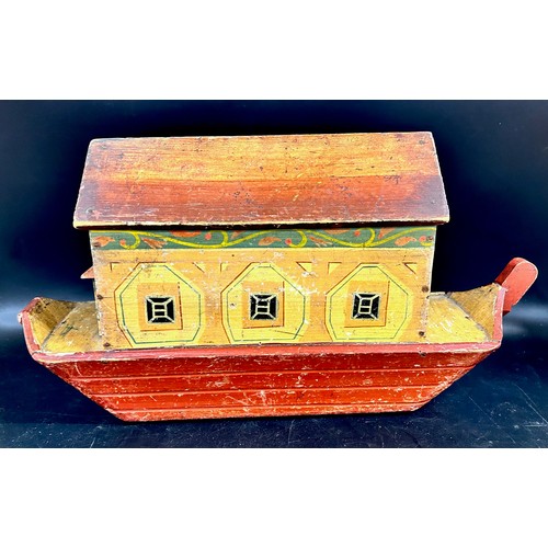 2277 - A 19th century painted wooden Noah's Ark toy, with sliding detachable side, 46cm long