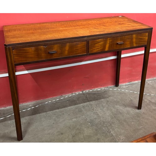 69 - A teak two drawer console table