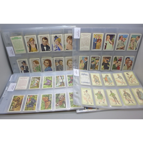2190 - Twelve full cigarette card sets, including John Player Standards and Cap Badges, Film Stars, Charact... 