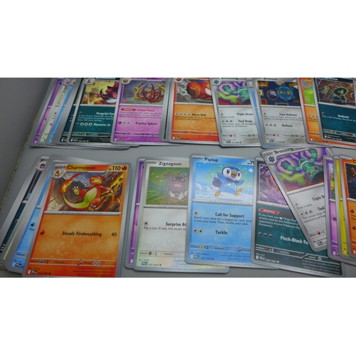 2219 - Pokémon cards; a mixed collection of Holographic, Non Holographic, no Energy cards, from multiple se... 