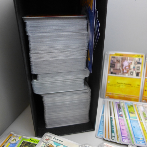2221 - A large collection of Pokémon cards including a large number of Holographic cards, including Rares, ... 
