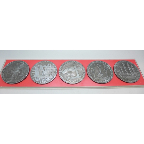 2239 - A collection of five desk medals, Khatyn Memorial in Belarus