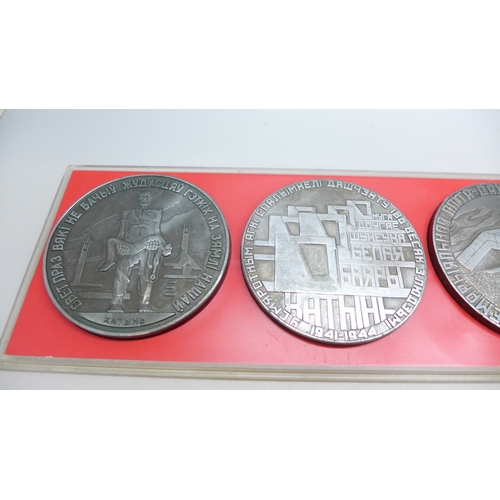2239 - A collection of five desk medals, Khatyn Memorial in Belarus