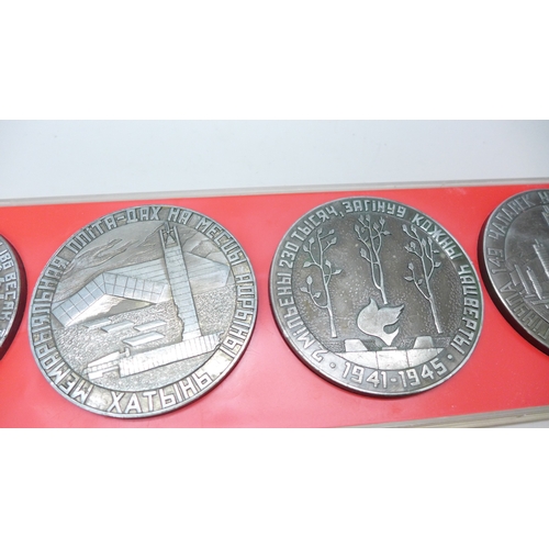 2239 - A collection of five desk medals, Khatyn Memorial in Belarus