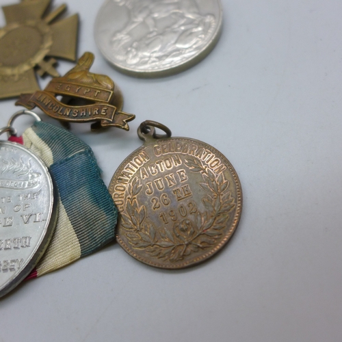 2243 - Two World War II medals, a cross medal and three medallions