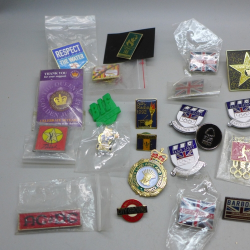 2250 - A collection of badges including Olympics