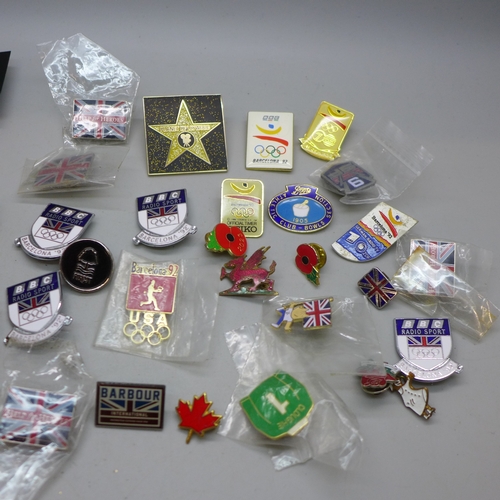 2250 - A collection of badges including Olympics