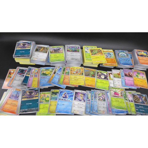 2217 - A large collection of 900+ Pokémon cards including quantity of holographic.