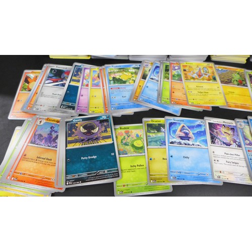 2217 - A large collection of 900+ Pokémon cards including quantity of holographic.
