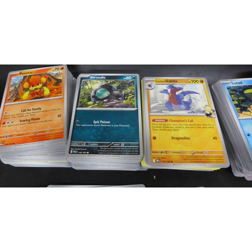 2218 - A very large collection of over 1000 Pokemon cards mixed holo, unholo including reverse holos