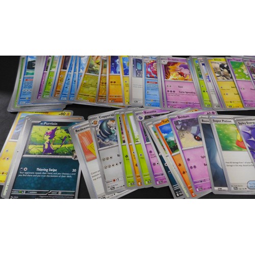 2218 - A very large collection of over 1000 Pokemon cards mixed holo, unholo including reverse holos