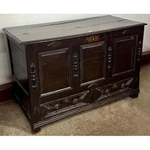 81 - A George I carved geometric moulded mule chest
