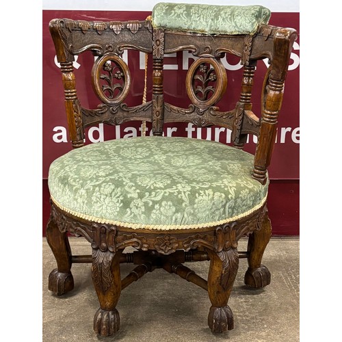 111 - A 19th Century Dutch style carved oak Burgomaster chair