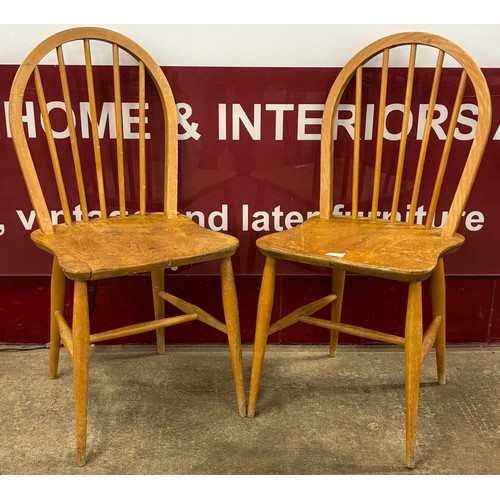 72 - A pair of Ercol elm and beech side chairs