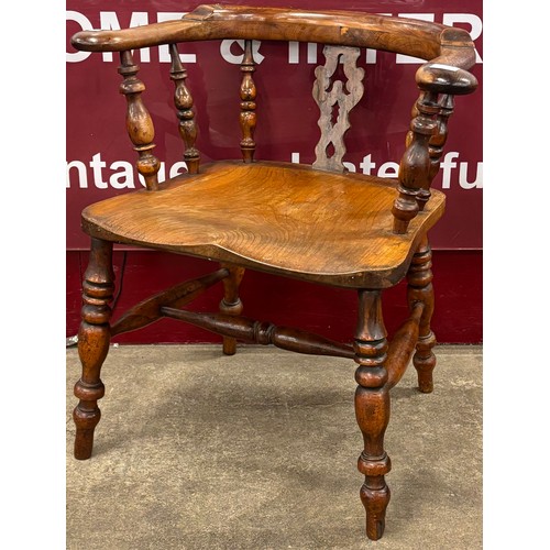 95 - A Victorian elm and beech smokers bow chair