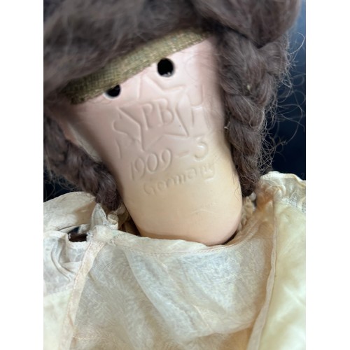 2293 - Two German dolls comprising of a Schoenau & Hoffmeister composite doll marked 1909-3 to back of head... 