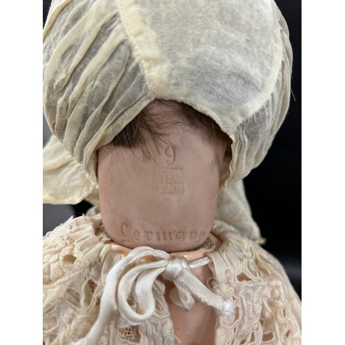 2293 - Two German dolls comprising of a Schoenau & Hoffmeister composite doll marked 1909-3 to back of head... 