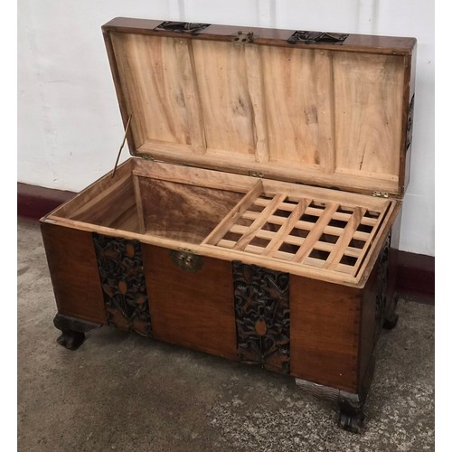138 - A Chinese carved camphorwood blanket box