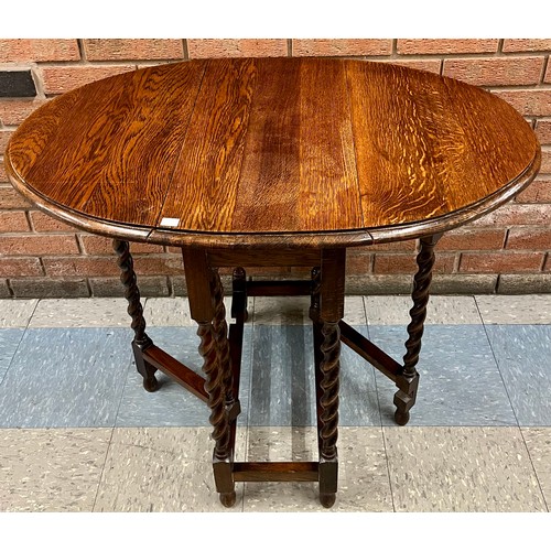 169 - An early 20th Century small oak barleytwist gateleg table