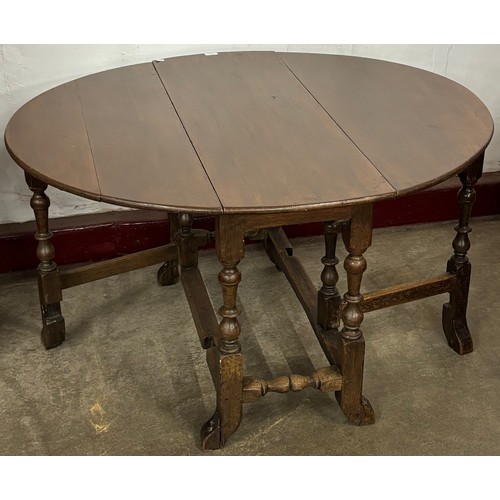 182 - An 18th Century style oak gateleg table