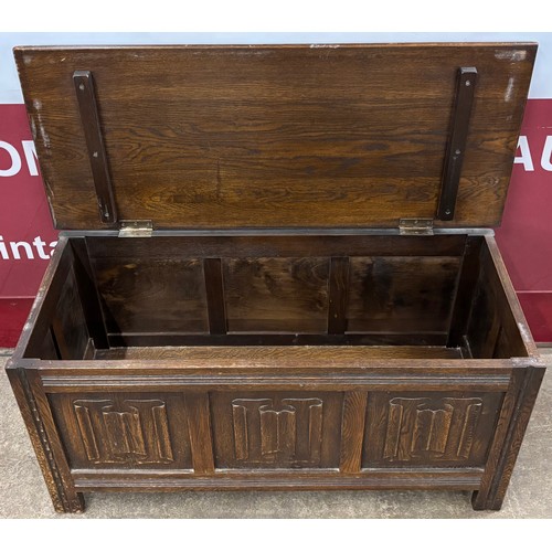 197 - An early 20th Century carved oak linenfold blanket box