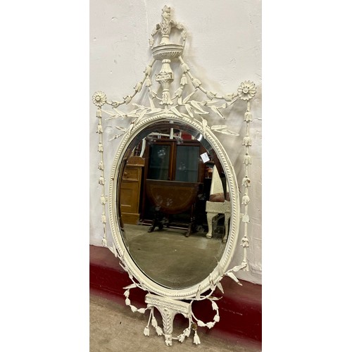 348 - A French Rococo style white painted mirror