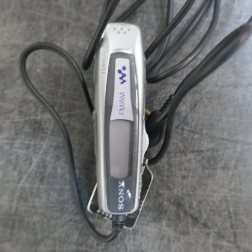 A Sony MZ-G750 walkman and sound FX case with built in speaker