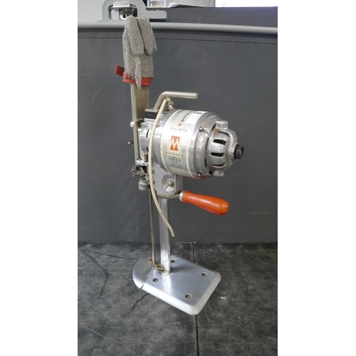A Malmin straight knife cutting machine with 11" blade - with chainmail ...