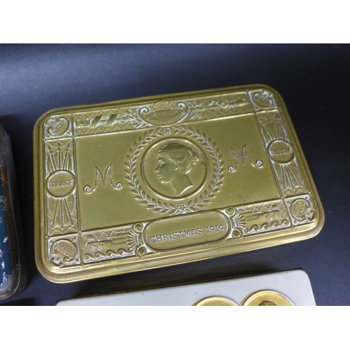 A WWI 1914 Christmas tin, a trench art alloy cigarette case with detail in  and out, a Queen Victoria