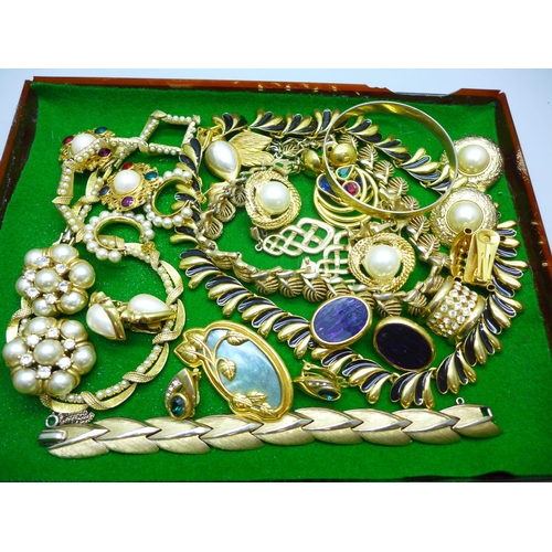 7137 - A collection of gold tone costume jewellery including Trifari, Napier, Monet, Corocraft, etc.