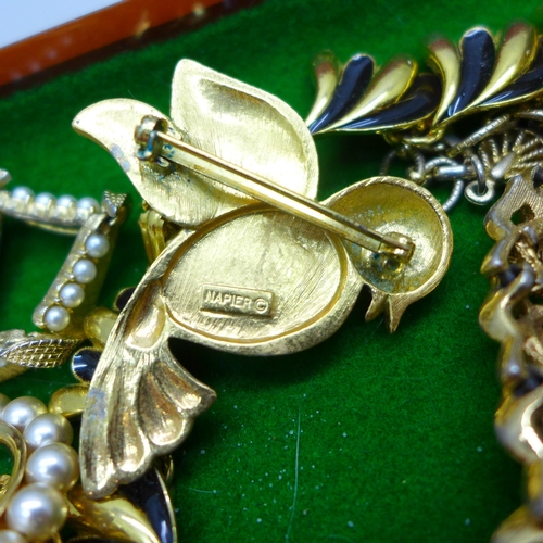 7137 - A collection of gold tone costume jewellery including Trifari, Napier, Monet, Corocraft, etc.