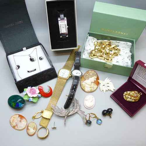 7138 - A collection of costume jewellery, a silver ying and yang jewellery set, cameos, watches, etc.