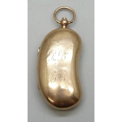 7122 - A 9ct gold double sovereign case with personalised engraving, 26g, 7.3cm including loop