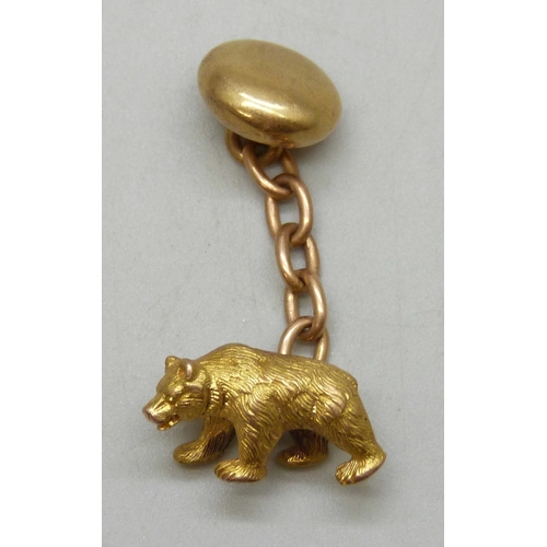 7124 - A yellow metal cufflink in the form of a bear, 4.8g