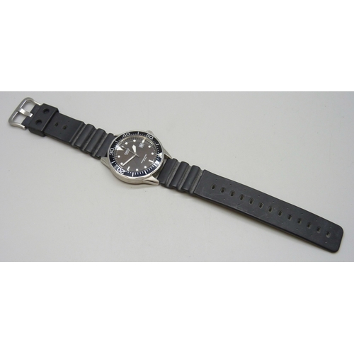 7144 - A Casio WR200M wristwatch with black dial and date aperture, 44mm including crown