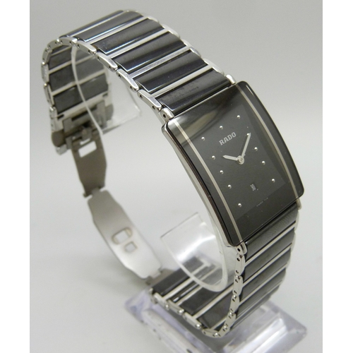 7146 - A Rado Diastar Titanium wristwatch with black dial and date aperture, 28mm including crown