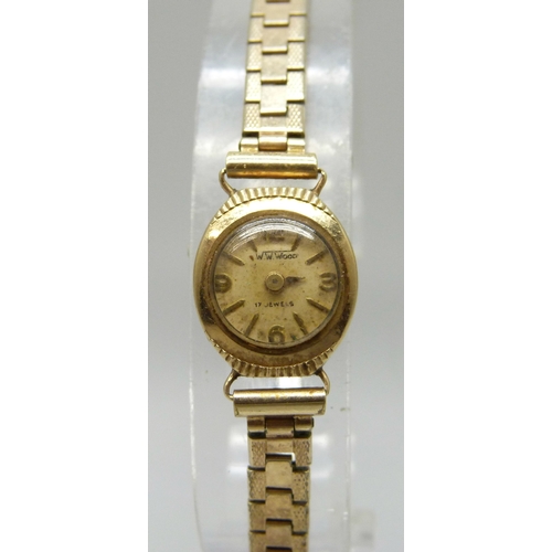 7150 - A 9ct gold cased lady's wristwatch on a plated strap, a/f, 1.3g case back