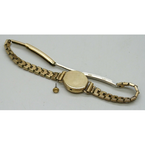 7150 - A 9ct gold cased lady's wristwatch on a plated strap, a/f, 1.3g case back