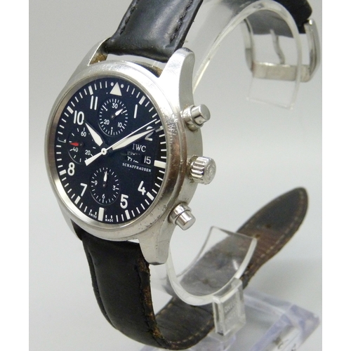 7161 - IWC, Schaffhausen, a Pilot black dial chronograph wristwatch with day/date aperture, with guarantee ... 