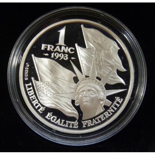 7183 - The Royal Mint, a 1994 silver proof three coin collection, silver dollar (26.73g 90%), 1 franc (22.2... 