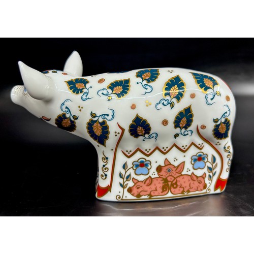 A Royal Crown Derby Priscilla Pig paperweight, an exclusive for