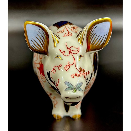A Royal Crown Derby Pig Money Box paperweight, gold stopper, boxed