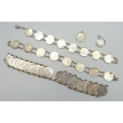 A collection of coin and token bracelets including silver examples, 58g ...