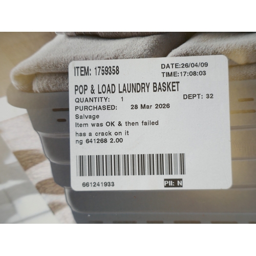 A Pop & Load collapsible laundry basket and a Berkshire heated throw ...