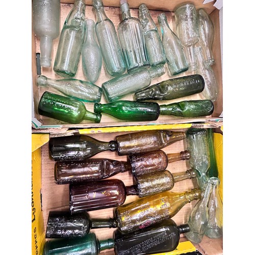 2152 - A large collection of vintage glass and stoneware bottles, approximately 60, including Hendry's Edin... 