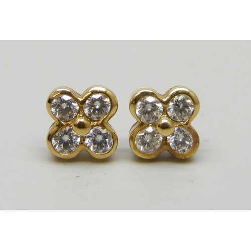 7008 - A pair of Tiffany & Co. New York 18ct gold and diamond stud earrings, 2g, approximately 7mm, boxed a...
